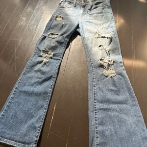 Distressed Levi’s Flare Jeans